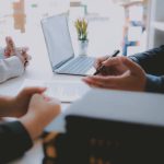 lawyer insurance broker consulting giving legal advice to couple customer about buying renting house. financial advisor with mortgage loan investment contract. Real Estate Agent selling real estate property