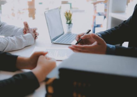 lawyer insurance broker consulting giving legal advice to couple customer about buying renting house. financial advisor with mortgage loan investment contract. Real Estate Agent selling real estate property